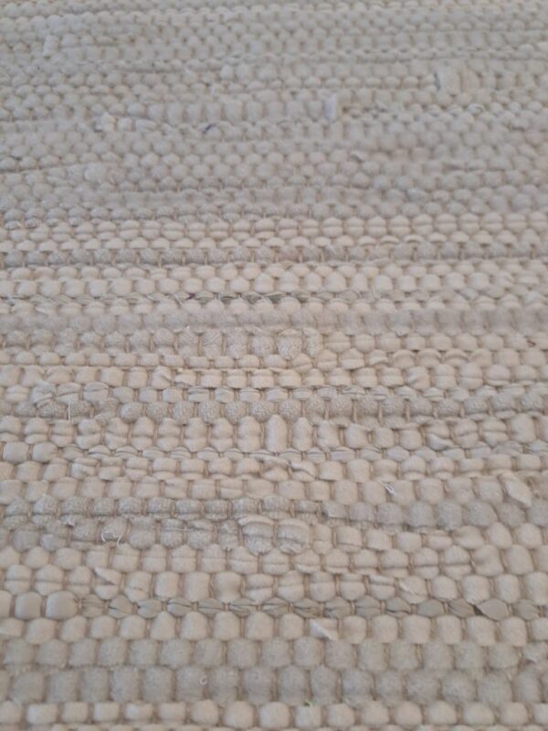 Fleckerelteppich Creme detail